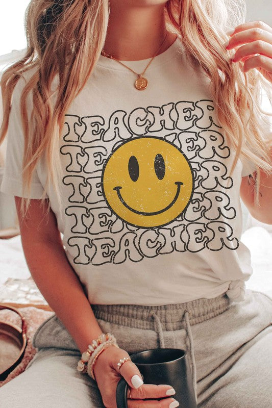 HAPPY FACE TEACHER REPEAT GRAPHIC TEE