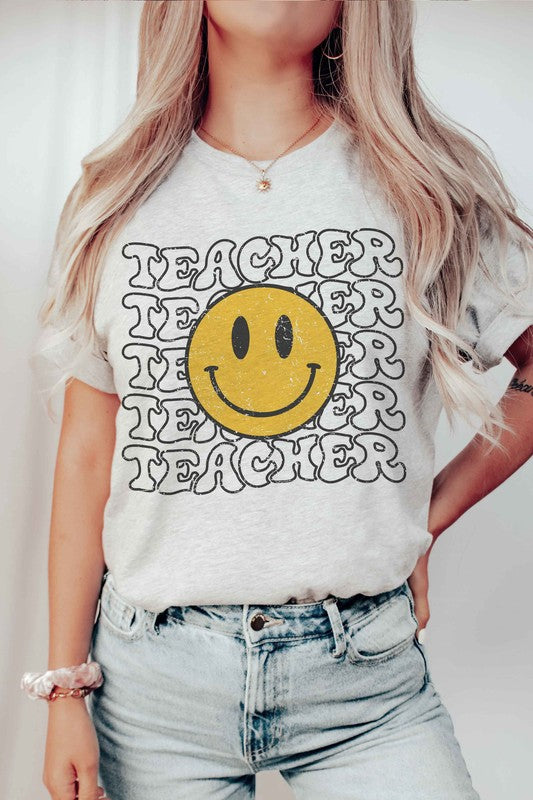 HAPPY FACE TEACHER REPEAT GRAPHIC TEE